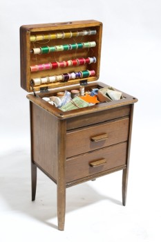 Sewing, Misc, SMALL CABINET, 2 DRAWERS, HINGED LID, DRESSED W/VINTAGE SEWING SUPPLIES, ROWS SPOOLS OF STRING, WOOD, BROWN