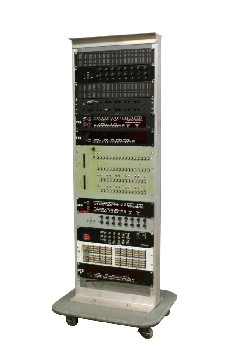 Electronic, Rack, RACK W/ELECTRONIC PANELS / COMPONENTS INCL BUTTON / TOGGLE SWITCH PANELS, WIRES, VENTS, ON ROLLING GREY BASE, METAL, MULTI-COLORED