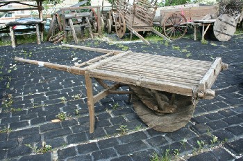 Cart, Rustic , 7FT HANDCART, SOLID WOODEN WHEEL, PLATFORM W/SPACED SLATS, NO SIDES, SOME ROPE WRAPPING, RUSTIC - Stored In Yard, Condition May Not Be Identical To Photo, WOOD, BROWN