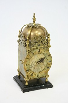Clock, Mantle, ANTIQUE LANTERN CLOCK W/ROMAN NUMERALS, ROUNDED TOP, FLORAL DECORATION, ORNATE HAND (1 MISSING), SQUARE WOOD BASE - Condition Not Identical To Photo, BRASS, BRASS