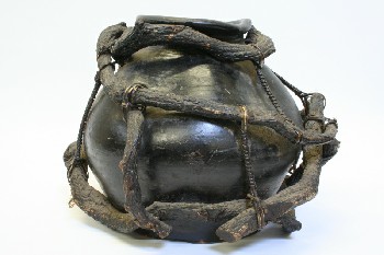 Decorative, Container, BULBOUS & WARPED,WRAPPED W/BRANCHES, POTTERY, BLACK