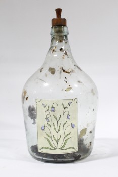 Decorative, Bottle, LEAVES RESIDUE,NEARLY EMPTY,WOOD CORK, PLANT LABEL, GLASS, CLEAR