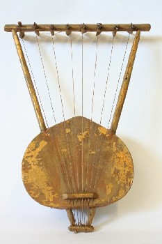Music, String, 8 STRINGED INSTRUMENT MADE FROM HALF COCONUT SHELL, PAINTED GOLD (FLAKING), COCONUT SHELL, BROWN